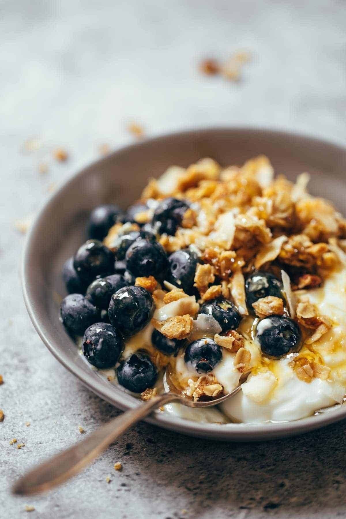 Perfect granola for taking along on summer vacation for easy, real food breakfasts! Made in 30 minutes. Simple and SO good! | pinchofyum.com
