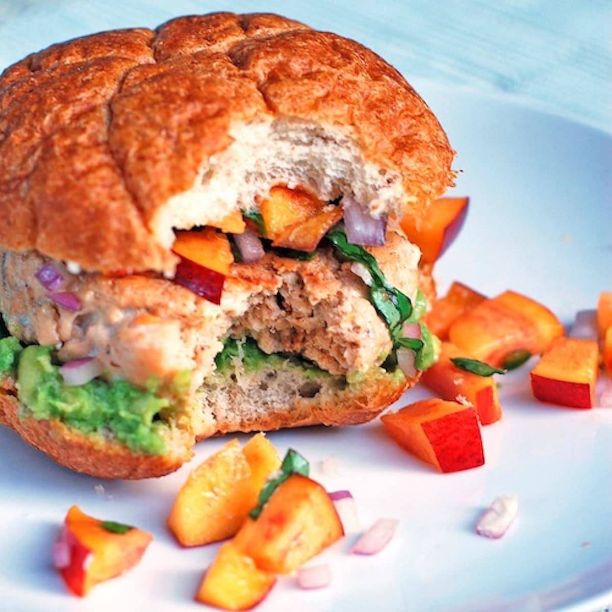 Chipotle turkey burger on a blue surface.